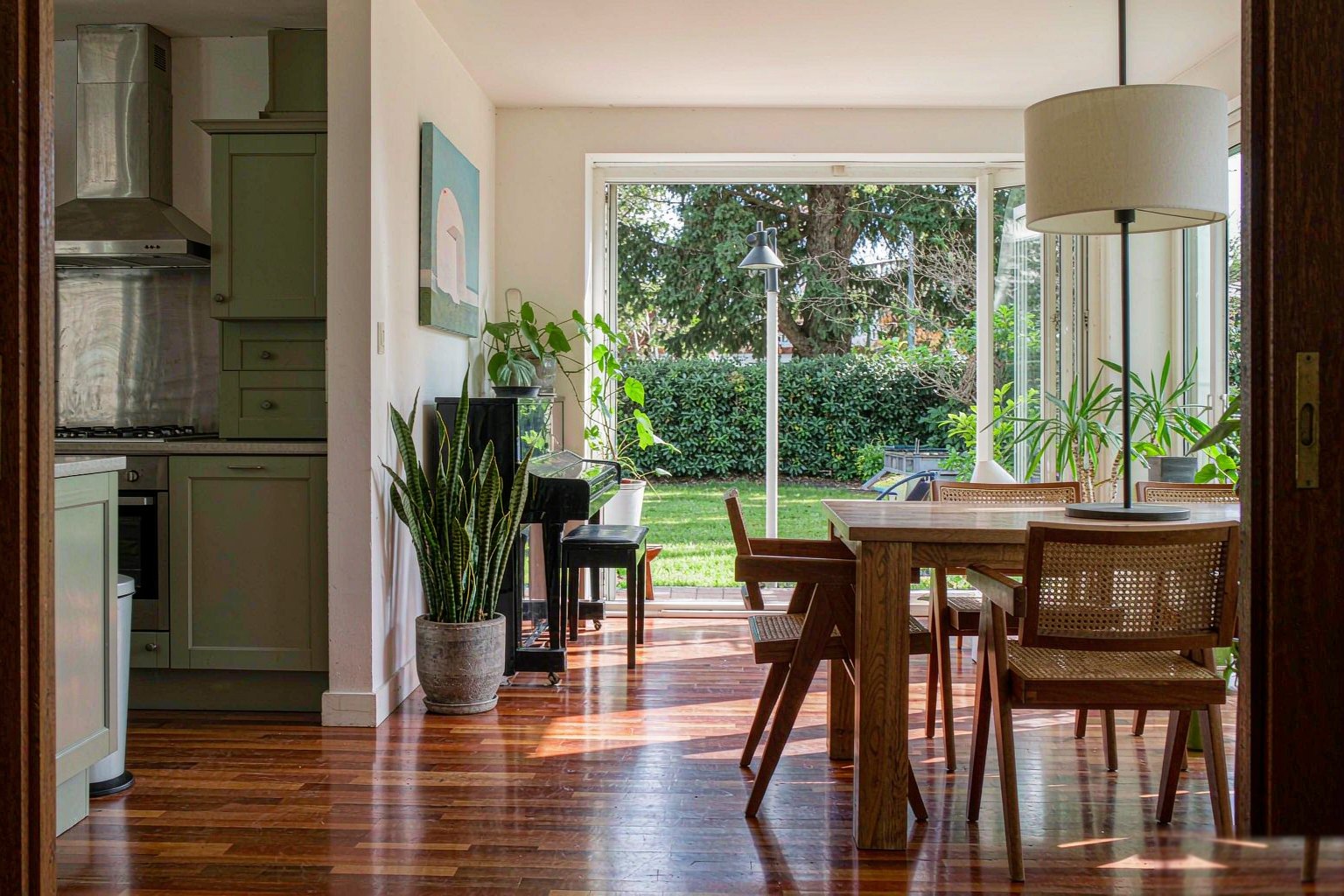 Open plan living and kitchen area in a garden apartment