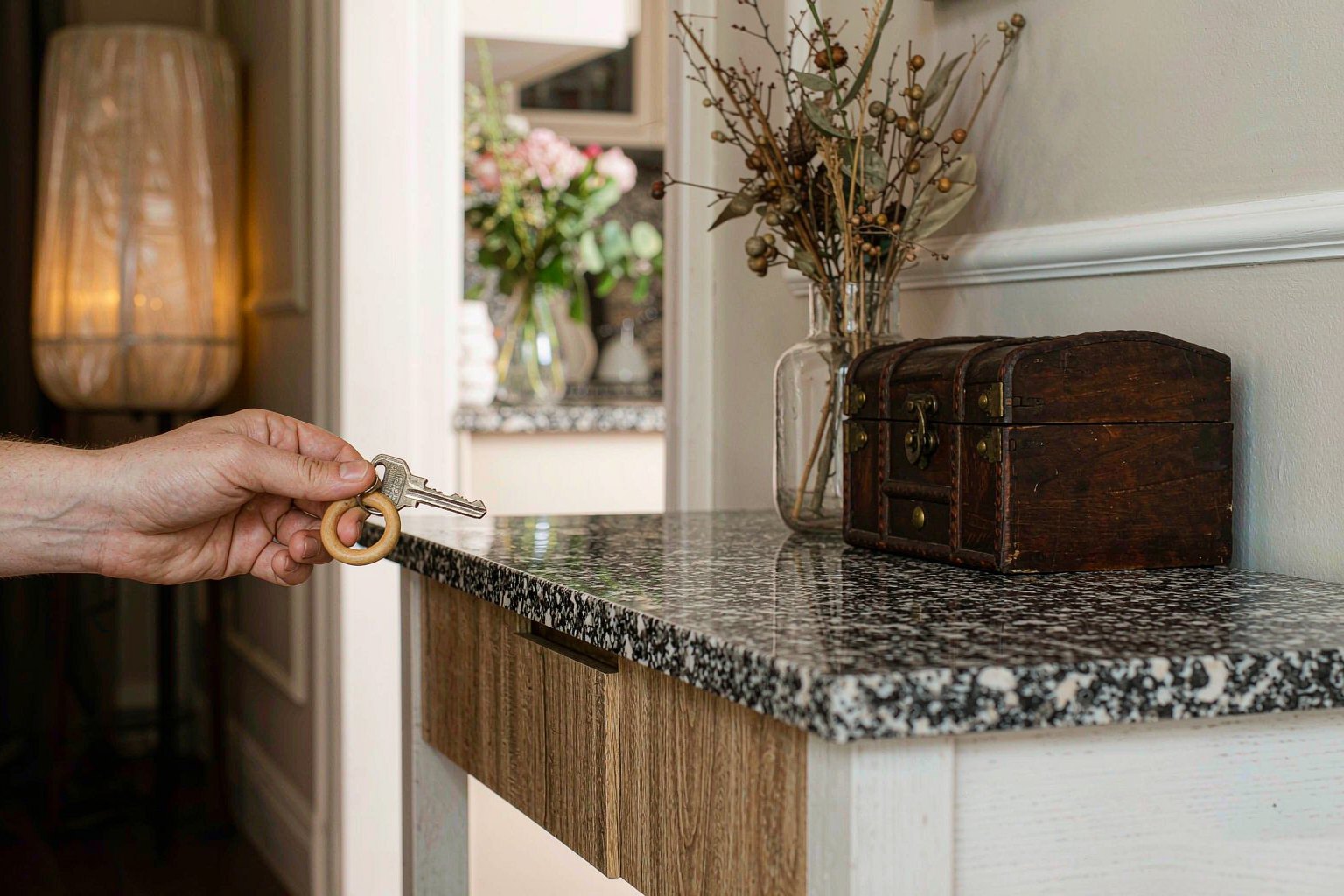 Keys being handed over at a furnished home